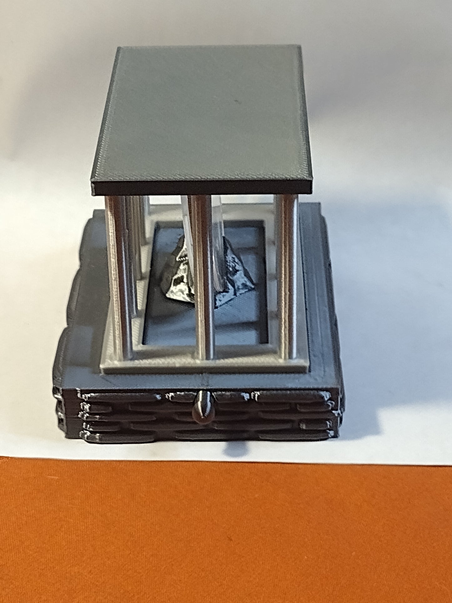 cage coin capsule display