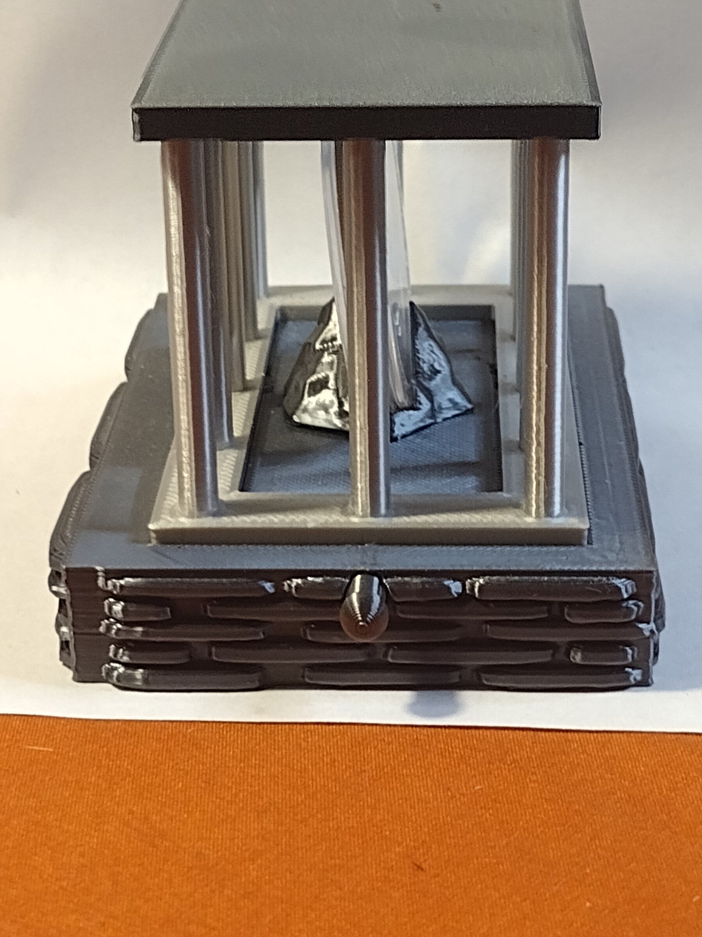 cage coin capsule display