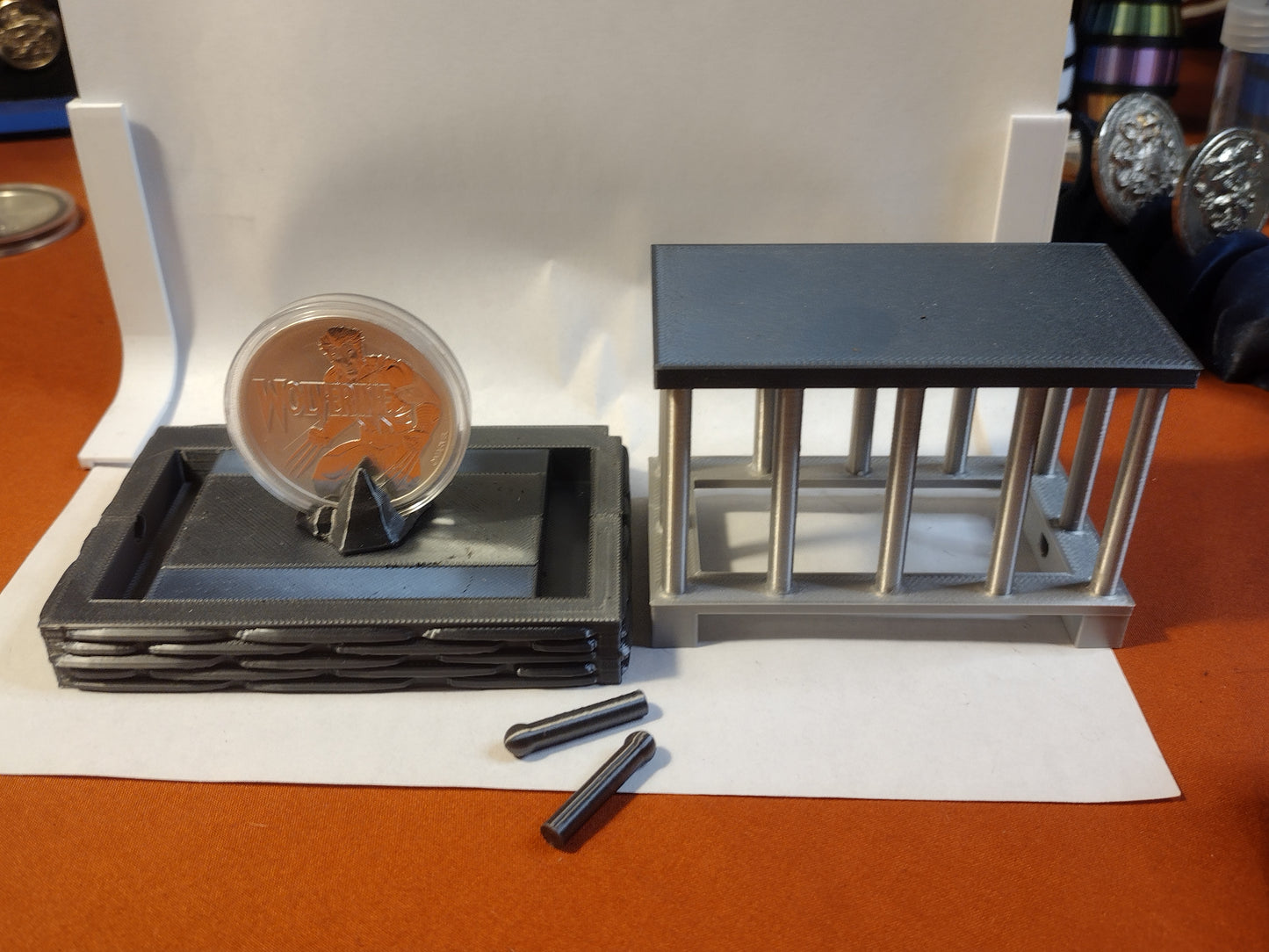 cage coin capsule display