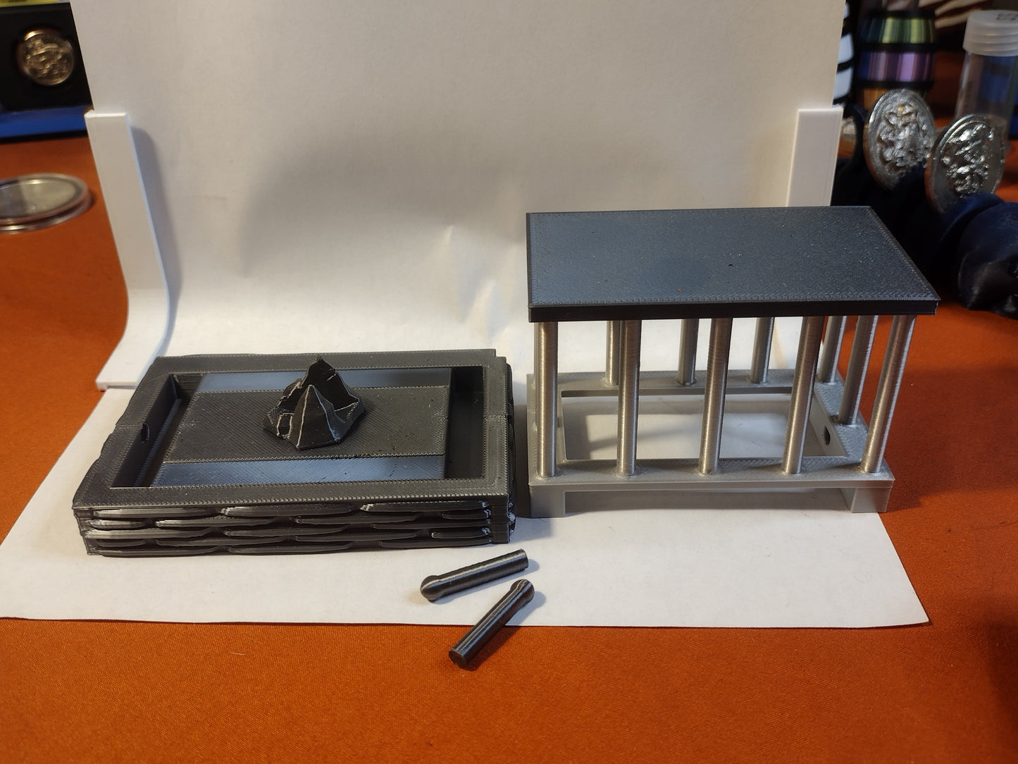 cage coin capsule display