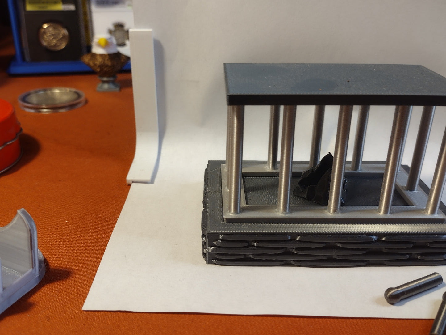 cage coin capsule display